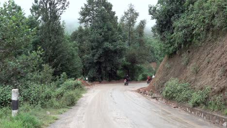 Kathmandu,-Nepal---September-27,-2019:-Traffic-and-vehicles-on-a-dangerous,-muddy-mountain-road-in-the-foothills-of-Kathmandu,-Nepal-on-September-27,-2019