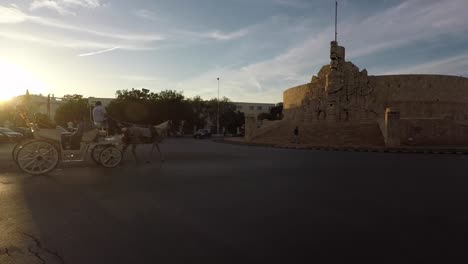 the-calandria-or-tumbril-ride-on-Montejo-avenue-in-Merida,-takes-us-back-to-the-colonial-era