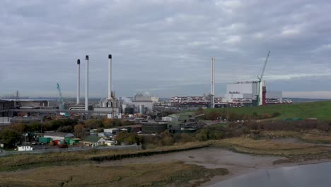 Aerial-orbit-view-of-K3-Kemsley-Power-Station,-And-DS-Smith-Paper-Mill-in-Sittingbourne,-Kent