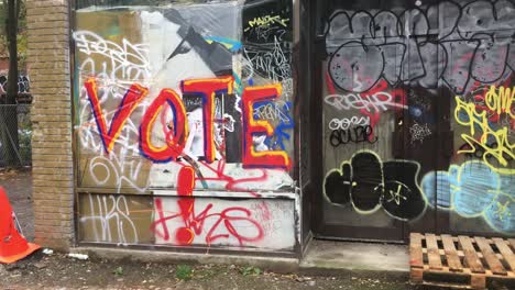 Vote-Graffiti-in-Kensington-Market,-static