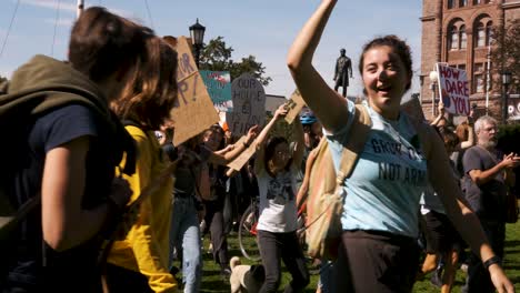 People-are-gathering-at-Queens-Park-Toronto-for-the-Climate-change-Campaign---close-up