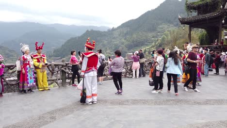 People-with-traditional-dresses-in-the-village-of-Xijiang-Qianhu-Miao-in-China