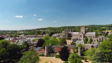 Aerial-view-of-Wells-Cathedral-and-the-moat-in-Bishops-Palace,-Somerset