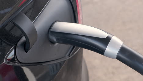 Tesla-Model-3-Charging-At-Supercharger-Station