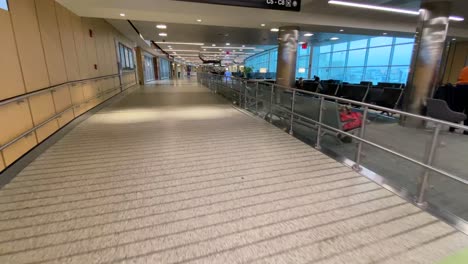 Boston,-Massachusetts---USA---April-9,-2020:-Walking-Shot-Of-Empty-JetBlue-Terminal-C-Gates-at-Boston-Logan-International-Airport-During-COVID19-Pandemic