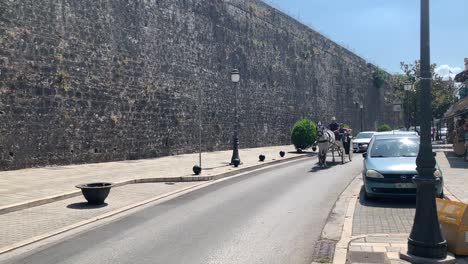 Horse-carriage-ride-against-the-Ottoman-castle-walls-in-Ioannina-Greece