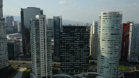 Drone-Flies-Over-Skyscrapers-in-Luxurious-Santa-Fe-Neighborhood-of-Mexico-City