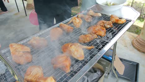 Marinated-chicken-with-various-spices,-grilled-over-charcoal