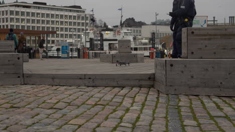 Finnish-policemen-preparing-to-launch-drone-for-surveillance-at-Helsinki-South-Harbour