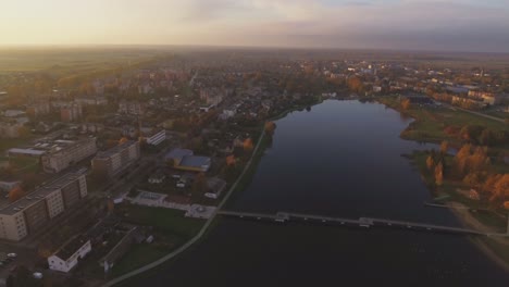 Pedestrian-Bridge-Over-The-Sirvinta-River-At-Sunset