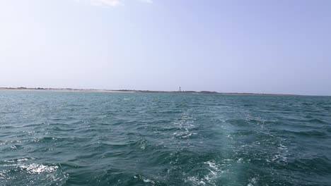 Waves-on-blue-sea-behind-the-speed-boat-water-in-sunny-day