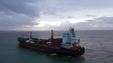 Isolated-container-cargo-ship-navigating-in-open-sea