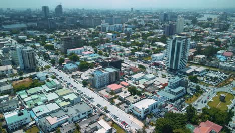 Victoria-Island-Lagos,-Nigeria---24-June-2021:-Drone-view-of-major-roads-and-traffic-in-Victoria-Island-Lagos-showing-the-cityscape,-offices-and-residential-buildings