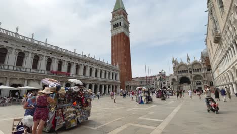 Walking-Towards-Campanile-Tower,-Piazza-San-Marco-in-Venice,-Italy