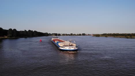 Aerial-View-Forward-Bow-Of-Destiny-Cargo-Ship-Travelling-Along-Oude-Maas