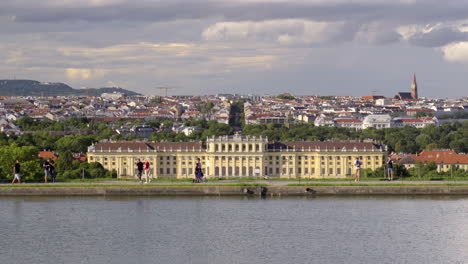 Tourists-exploring-grounds-at-Schönbrunn-Castle---Medium-shot