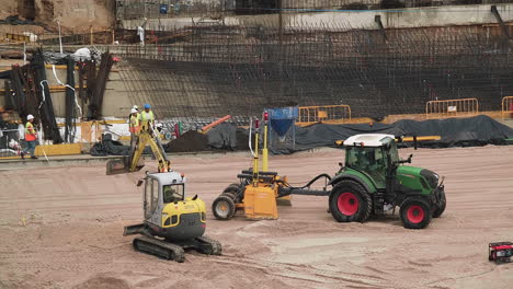 Male-Operator-Working-And-Driving-Tracked-Loader-Inside-Santiago-Bernabeu-Stadium-Under-Renovation