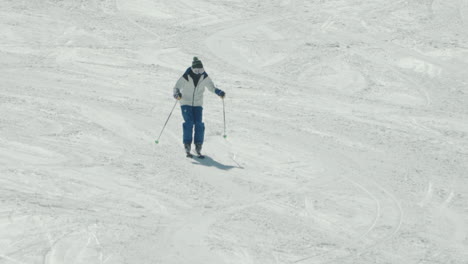 Tourist-Ski-Downwards-On-The-Snow-Covered-Terrain-Of-The-Ski-Resort-In-Okuhida-Region-Of-Northern-Japan-Alps-In-Gifu-Prefecture