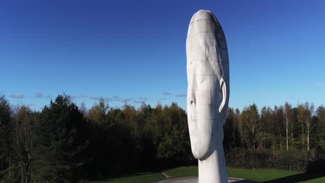 The-Dream-sculpture-Bold-forest-landmark-face-obelisk-statue-aerial-view-St-Helens-low-to-high-rising