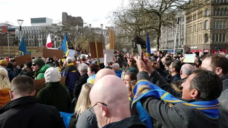 Group-of-people-support-at-Ukraine-anti-war-protest-activists-on-Manchester-city-street