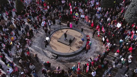 Freedom-protest-speaker-Calgary-downtown-aerial-pullout