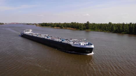 Aerial-Starboard-View-Of-Minerva-Liquid-Tanker-Ship-Approaching-Along-Oude-Maas-In-Zwijndrecht