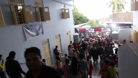 People-walking-towards-market-in-a-fair