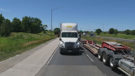 Highway-travel-near-New-Lenox-Illinois-front-view-of-a-truck-i80-east-slow-moving-traffic