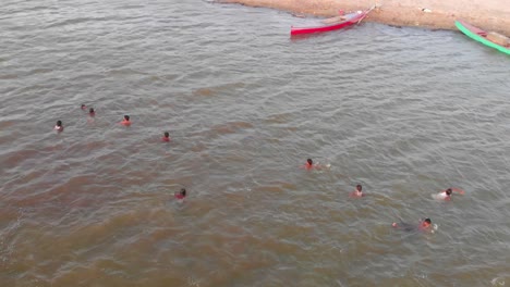 Aerial-Overhead-View-Of-Male-Rescuers-Swimming-For-Flood-Rescue-Training-In-Balochistan