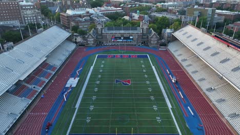 Aerial-reveal-of-Philadelphia-skyline-over-Franklin-Field