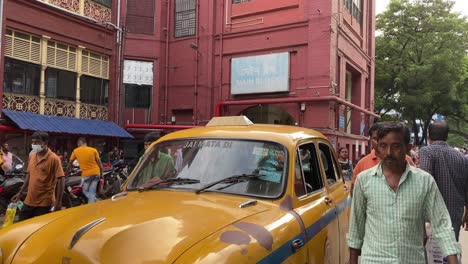 Wide-shot-video-of-people-walking-in-front-of-Main-block-of-SSKM-Hospital-in-Kolkata