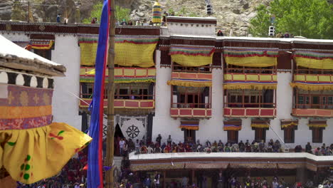 Buddhist-Hemis-monastery-on-Hemis-festival-with-tourists,-dolly-shot-sideways