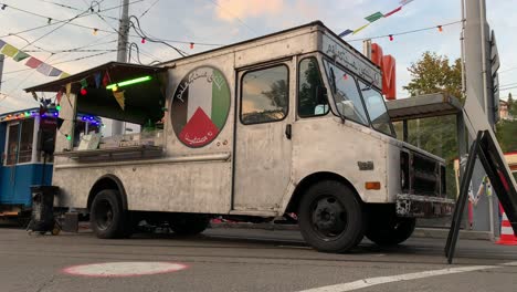 Palestinian-Food-truck-shot-from-low-angle-at-summer-fair-next-to-Tram-Museum-in-Zurich-Switzerland