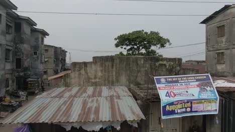 Aerial-shot-of-Jakande-slum-in-Lekki,-Lagos,-Nigeria,-Africa