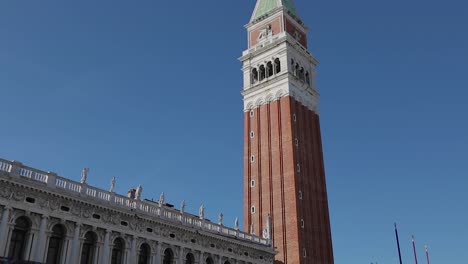 Tilt-shot-for-Saint-Marc-square-full-of-tourists-walking-towards-the-Grand-Canal