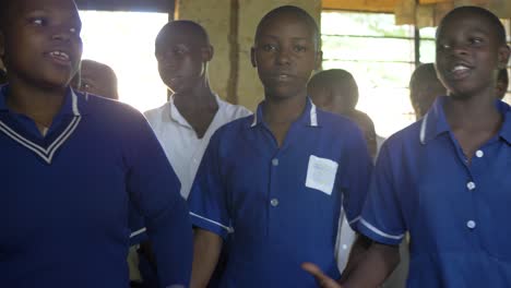 A-close-up-shot-of-a-group-of-African-primary-school-children-singing-a-song-in-a-community-school-in-Uganda