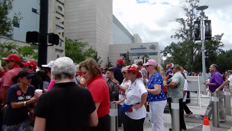 People-gather-to-hear-and-see-President-Donald-Trump-at-a-political-rally-