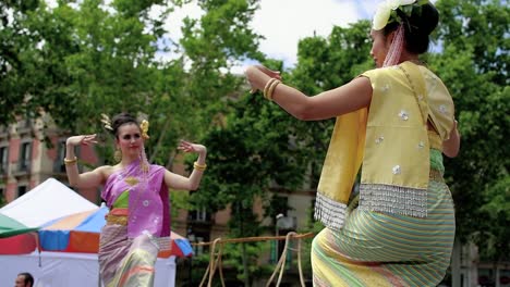 Two-thai-girls-dancing-in-a-perfomance-in-Barcelona