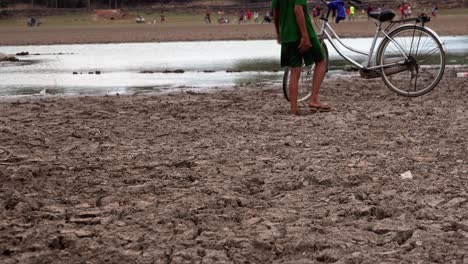 Close-Shot-of-Asian-Family-Playing-Near-the-Lake