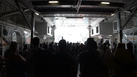 People-waiting-to-disembark-ferry,-interior-view