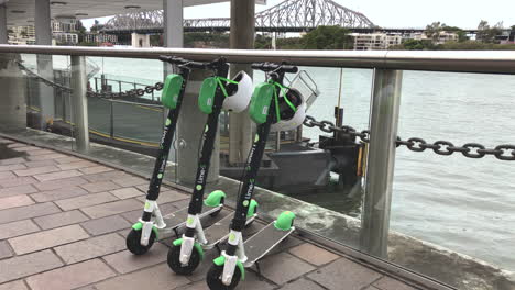 Brisbane-Lime-Scooters,-with-Story-Bridge-in-background