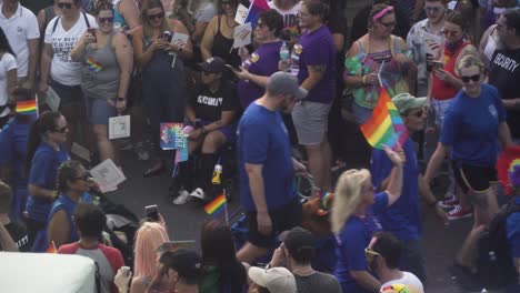 People-Marching-in-Street-at-River-City-Pride-Parade-in-Jacksonville,-FL