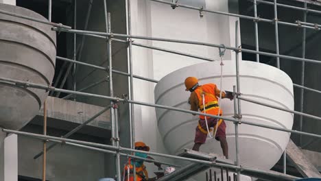 Trabajadores-De-La-Construcción-Capa-De-Yeso-En-La-Pared