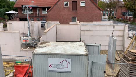 Construction-workers-work-on-a-construction-site-and-build-a-architecture-house-in-Germany