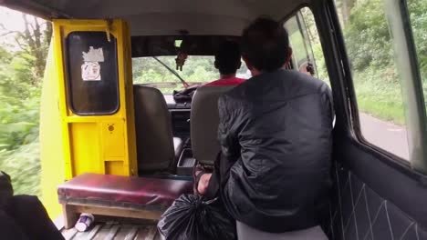 driving-a-small-local-bus-on-a-bouncy-road-in-Bandung-Indonesia