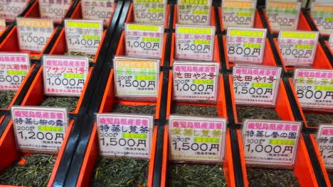 Different-types-of-Japanese-green-tea-in-a-traditional-store-in-Shinjuku-Tokyo-city-Japan,-4K-panning-left