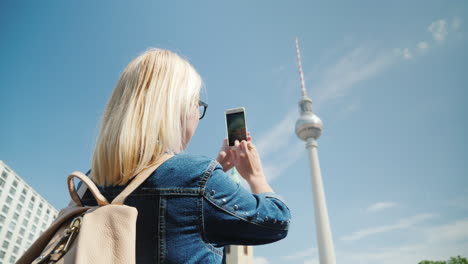 Woman-Takes-Photos-Of-Berlin-TV-Tower