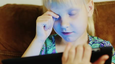 Young-Caucasian-Girl-Using-A-Tablet-05