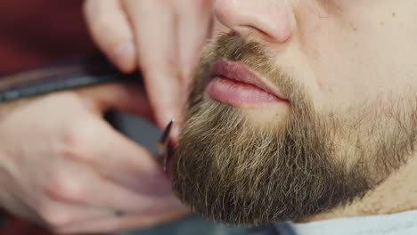 Close-Up-Of-Beard-Being-Trimmed-By-Barber