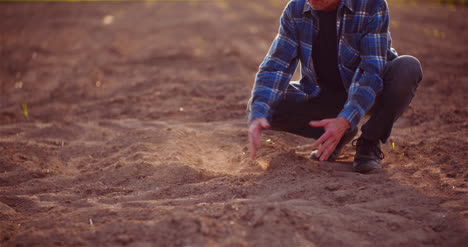 Soil-Agriculture-Farmer-Hands-Holding-And-Pouring-Back-Organic-Soil-Farmer-Touching-Dirt-On-Farm-1